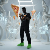 male model holding pizza slices in a futuristic setting with digital elements, wearing a black t-shirt with QR code for AR video activation.